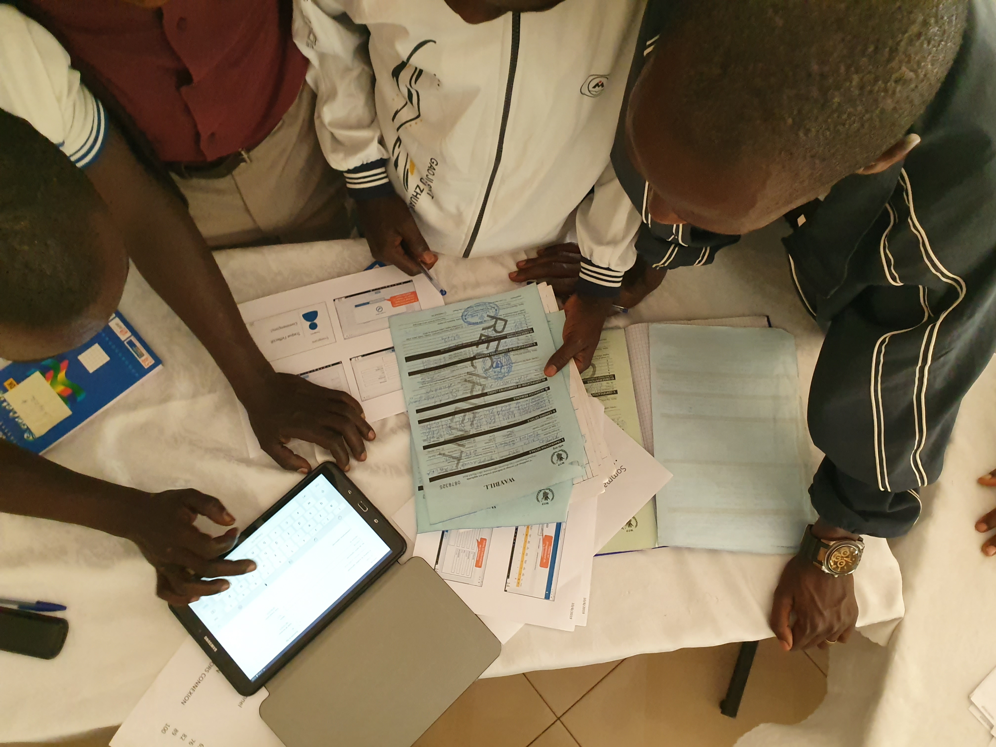 Compiling school data. Photo: WFP/Ramin Gallenbacher