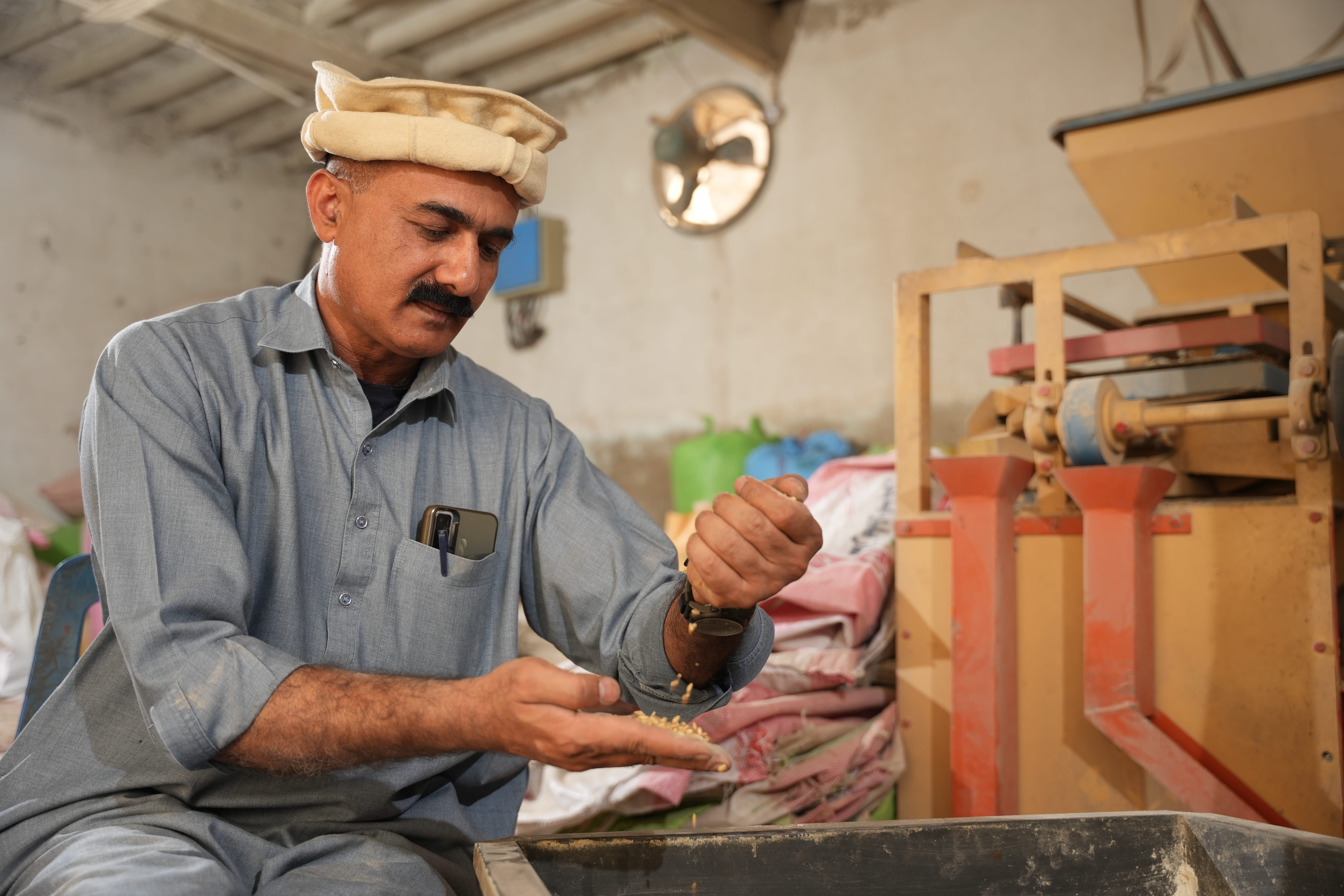 A man with fortified flour in his hands. 