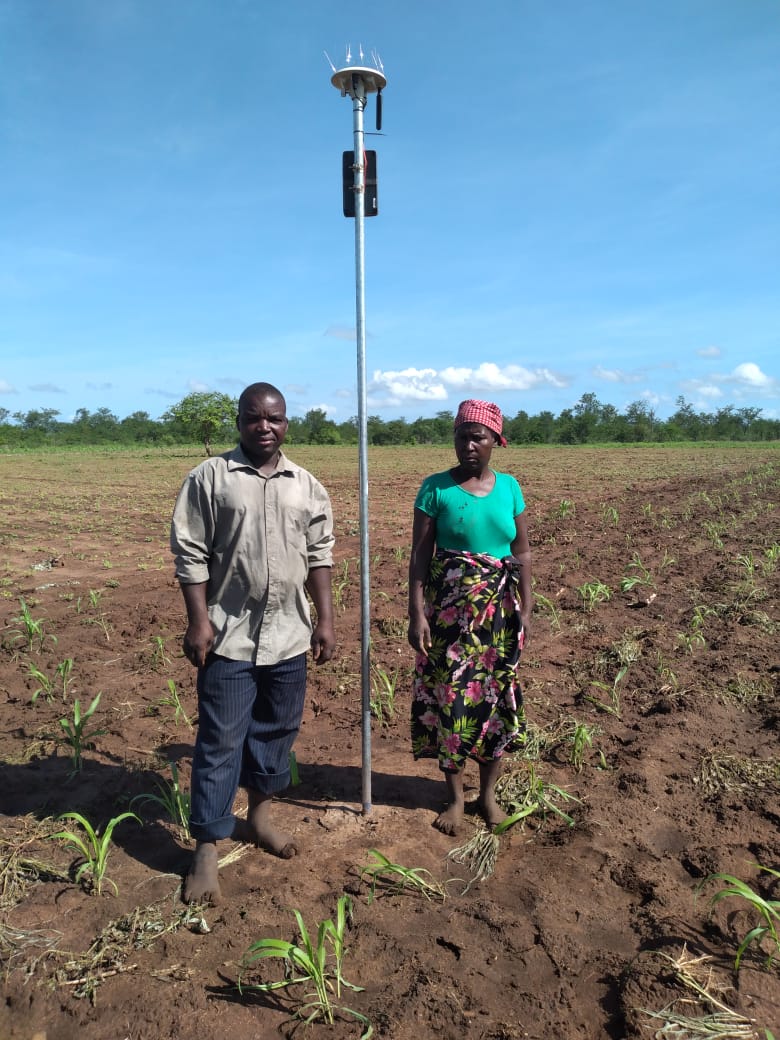 A man and a woman standing beside the Arable device