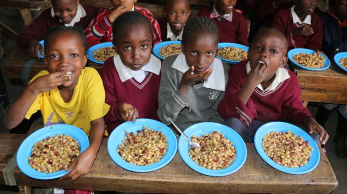 Cash to Schools.jpg School children eating a meal