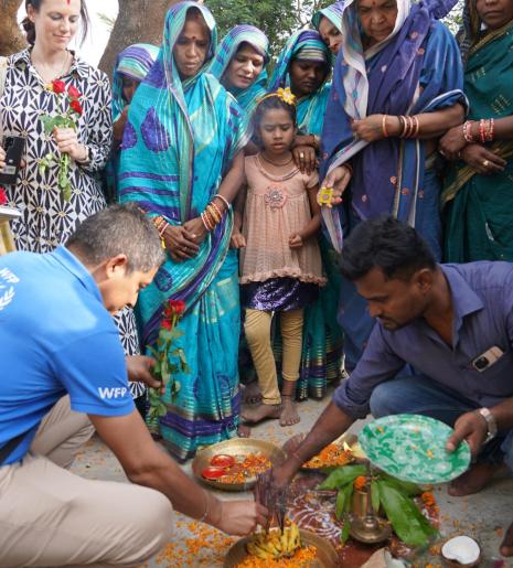 WFP employees and the local community honor the launch of S4S