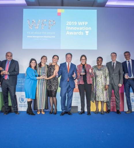 Country, Region and Division Directors receive the 2019 WFP Innovation Awards from Executive Director David Beasley at the Global Management Meeting in London. Photo: WFP/Rein Skullerud