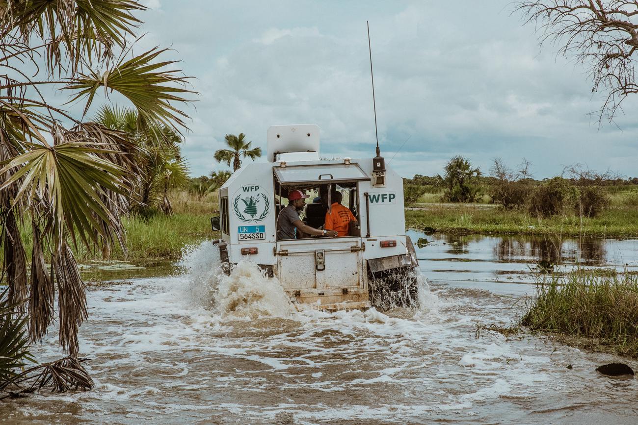 SHERP vehicle drives through a flood.