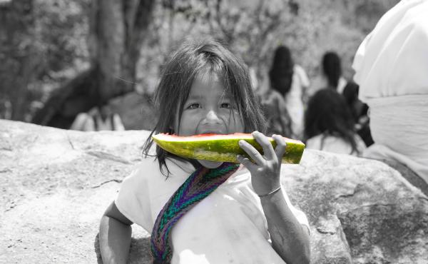 Girl eating a watermelon; Photo WFP/Lorena Peña
