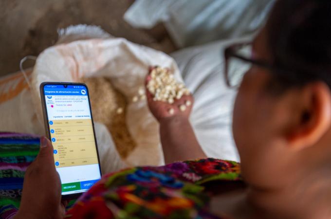 Smallholder farmer with phone